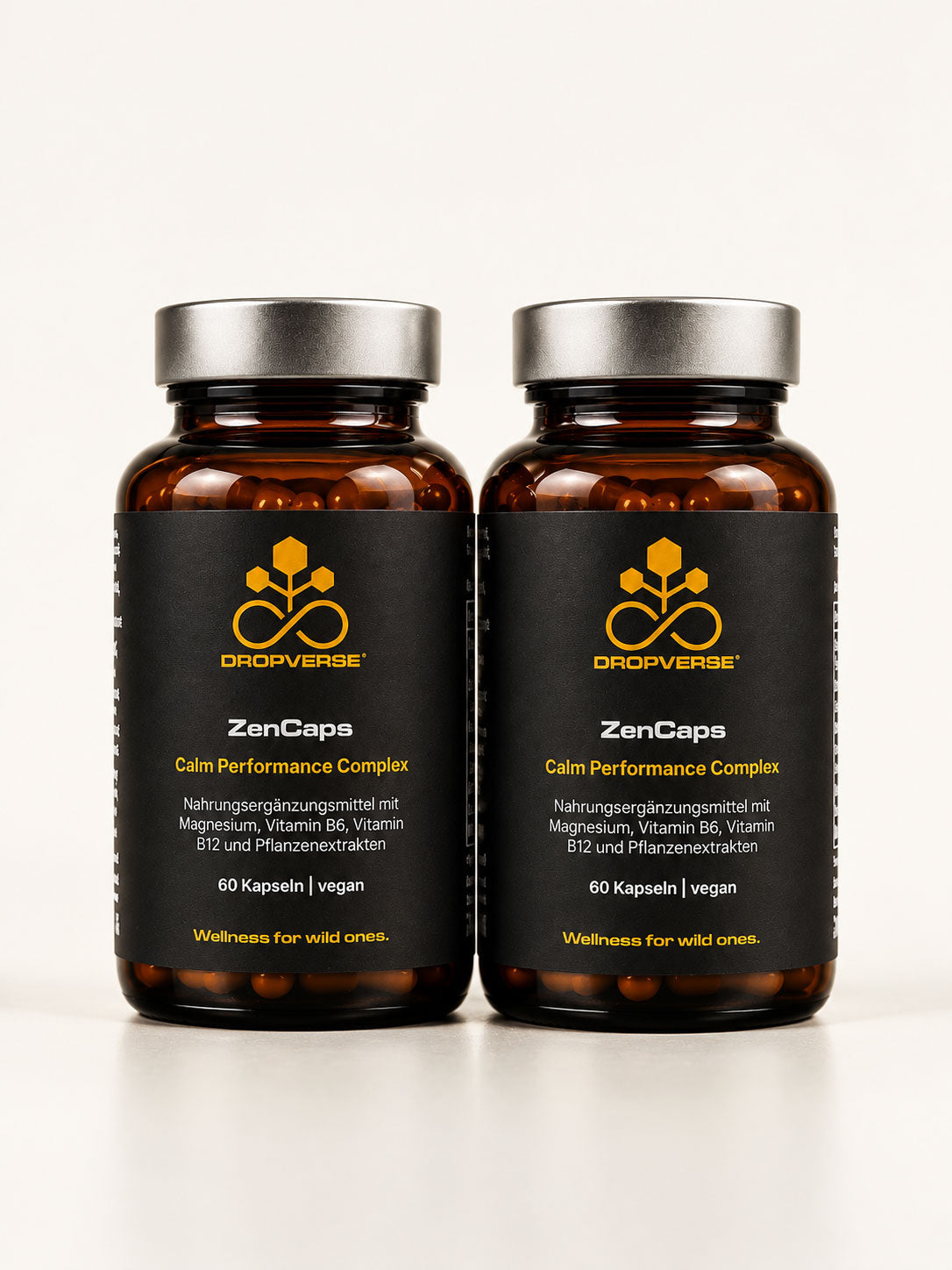 Zwei DROPVERSE® ZenCaps Gläser nebeneinander