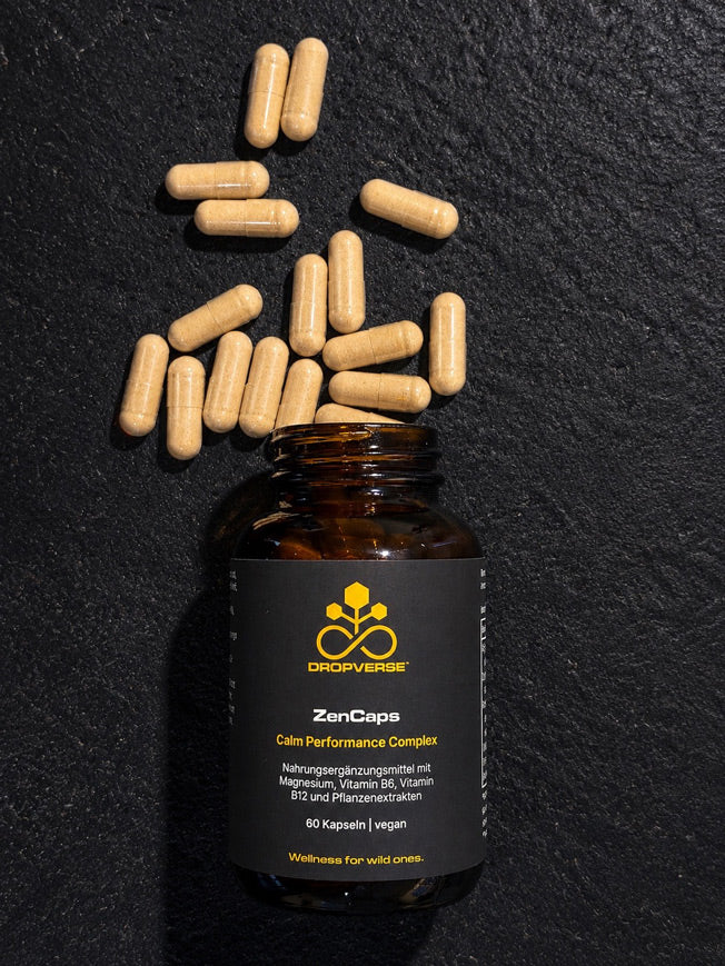 DROPVERSE ZenCaps Nahrungsergänzungsmittel Supplement mit Braunglasflasche und verstreuten Kapseln